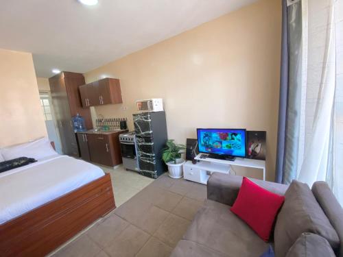 Kuchyň nebo kuchyňský kout v ubytování KinAirbnb