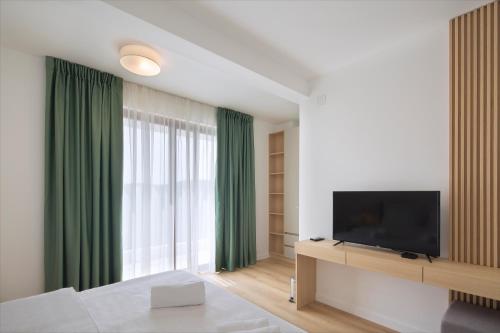 Μια τηλεόραση ή/και κέντρο ψυχαγωγίας στο Villa Fotinia