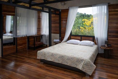 Hotel Pachamama Campestreにあるベッド