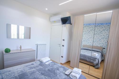 Postel nebo postele na pokoji v ubytování Villa Teresa Relax