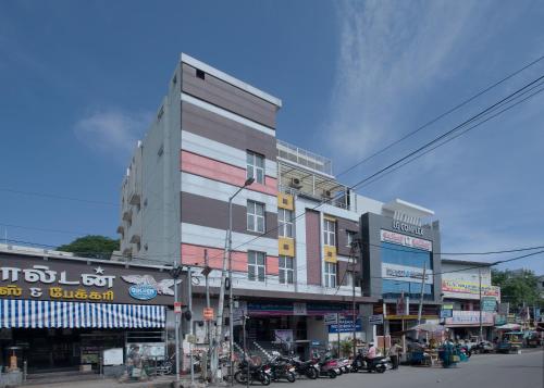 a building on the side of a city street at Prasana Residency in Tiruchchirāppalli