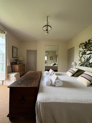 Postel nebo postele na pokoji v ubytování Le Mas du Chemin : mas typique des Alpilles