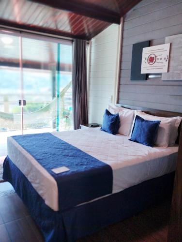 Ένα ή περισσότερα κρεβάτια σε δωμάτιο στο Hotel Arlen 4