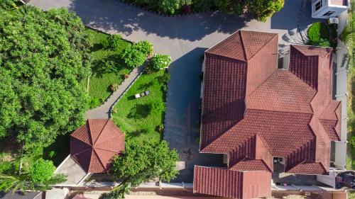 an overhead view of a house with a red roof at Plavender Inn in Dar es Salaam