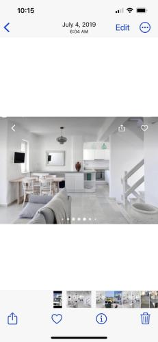 a rendering of a living room and dining room at Villa Galano PAROS GREECE in Ambelas