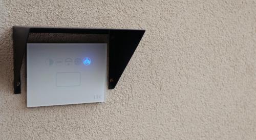 a box on the side of a wall at Hotel Miramare in Pineto