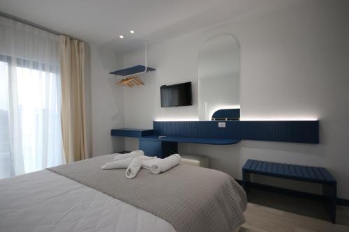 Postel nebo postele na pokoji v ubytování Bay View Hotel