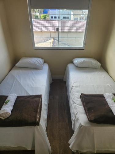 Łóżko lub łóżka w pokoju w obiekcie Ap completo proximo ao aeroporto