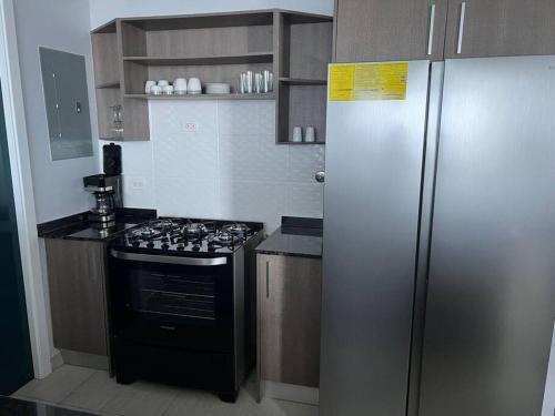 Kuchyň nebo kuchyňský kout v ubytování Hermoso Apartamento de Playa