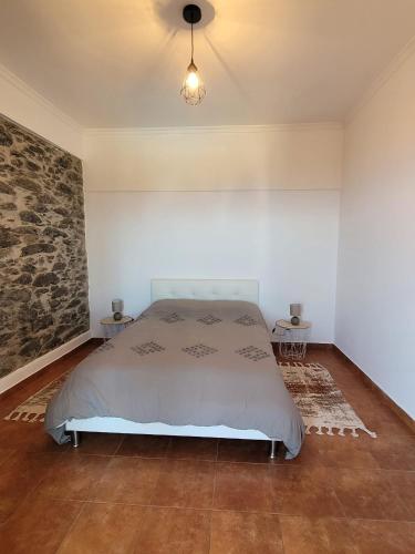 Ένα ή περισσότερα κρεβάτια σε δωμάτιο στο Sunset Paradise Villa with Heated Pool