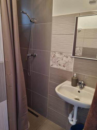 Kúpeľňa v ubytovaní Napfény Apartman