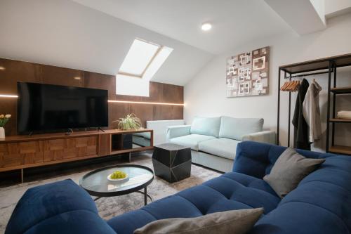 TV a/nebo společenská místnost v ubytování CORU House