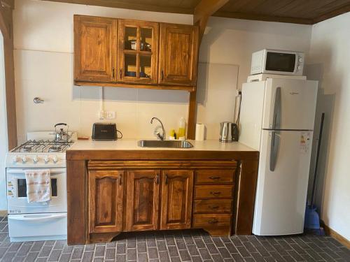 Kuchyň nebo kuchyňský kout v ubytování Los Frutales