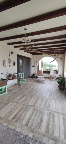 a large room with a wooden floor and a ceiling at B&B Della Via Francigena in Agrigento