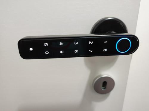 a black remote control on a door handle at Oniria Suite - 100 mt dal mare in Terracina
