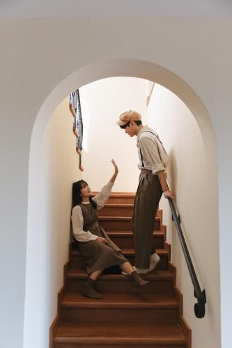 a statue of a man and a woman climbing stairs at Private Pool Villa & Golf - Toscana House Khaoyai 4 Bedrooms 10 Guests in Ban Rai Khlong Sai