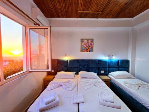 Postel nebo postele na pokoji v ubytování Enma Rooms