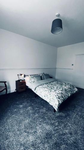Katil atau katil-katil dalam bilik di Lansdowne Apartments