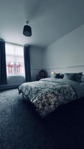 Katil atau katil-katil dalam bilik di Lansdowne Apartments