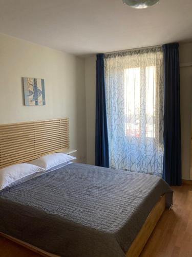 Postel nebo postele na pokoji v ubytování Casitta Stesicoro