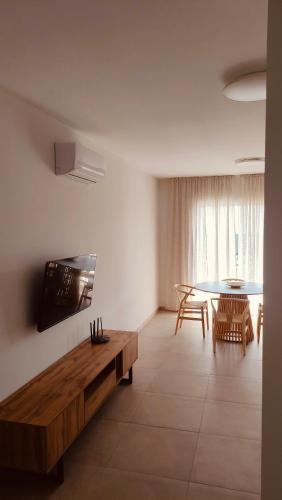 Posezení v ubytování Two bedroom apartment with pool