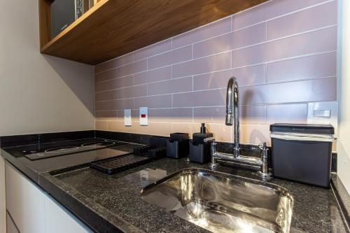 A cozinha ou cozinha compacta de 360 Ambience Vila Mariana