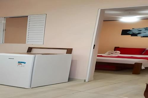 Ένα ή περισσότερα κρεβάτια σε δωμάτιο στο POUSADA RECANTO DANTAS, ACONCHEGO EM PARATY