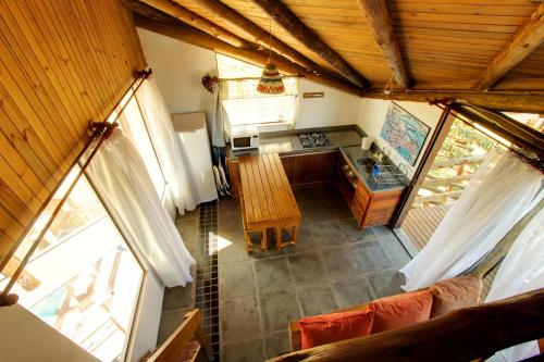 an overhead view of a kitchen in a house at Pousada Arágua in Bombinhas