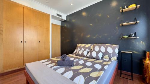 Giường trong phòng chung tại Blaumar Atico