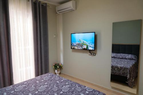 Кровать или кровати в номере Cozy Appartment