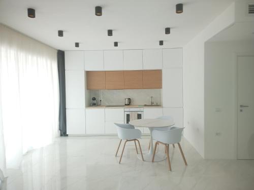 Kuchyň nebo kuchyňský kout v ubytování Smart Luxury Suites & Apartments