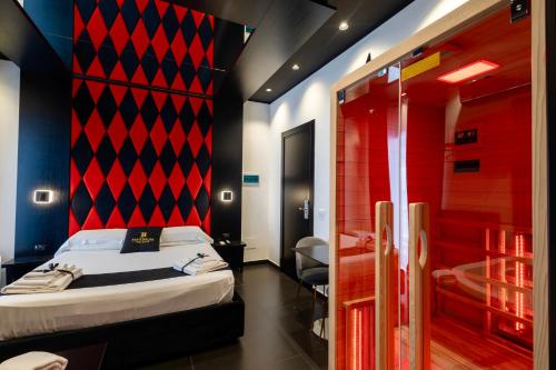 Cama o camas de una habitación en Maximum hub suite&spa