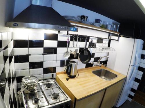 Kuchyň nebo kuchyňský kout v ubytování LoFt mANoLO