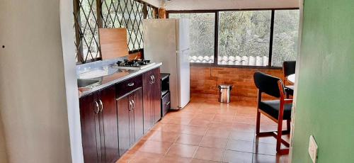 Kuchyň nebo kuchyňský kout v ubytování Hacienda Moncora, un lugar hermoso para toda la familia y los amigos