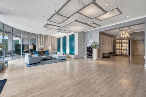 a large living room with couches and a table at Ocean View Hotel in Los Angeles