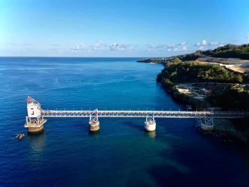an aerial view of a bridge in the water at Sweet Sunset 4 Playa Rompeolas, Aguadilla in Aguadilla