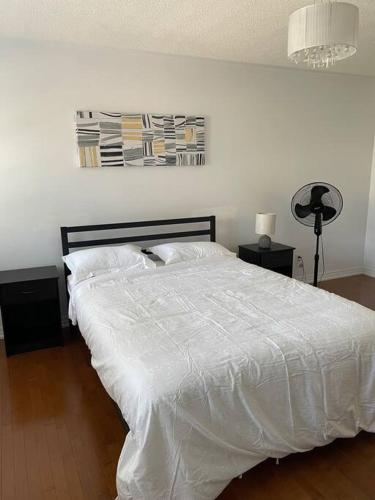 Ένα ή περισσότερα κρεβάτια σε δωμάτιο στο Executive End Unit Townhome