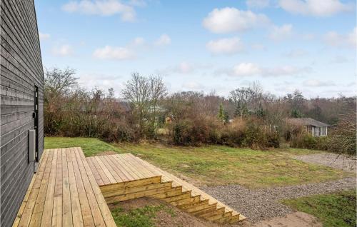 a wooden deck on the side of a house at Nice Home In Vordingborg With Wifi in Vordingborg