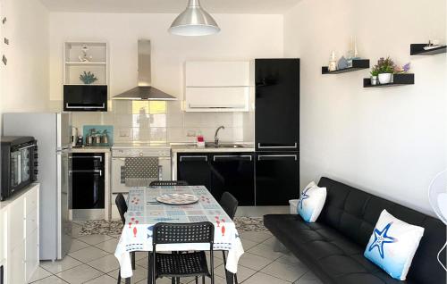 Kuchyňa alebo kuchynka v ubytovaní Pet Friendly Home In Ispica With Wifi