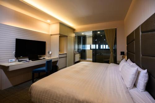 Ein Bett oder Betten in einem Zimmer der Unterkunft Hotel Geight Taipei