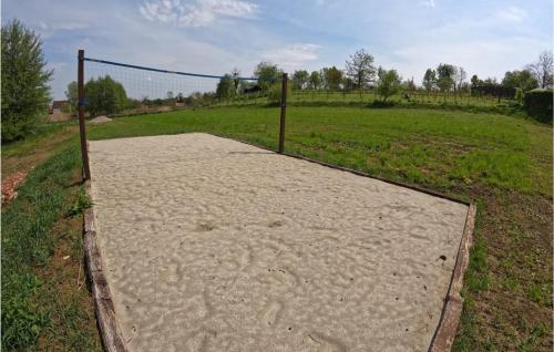 a fence in the middle of a field at Lovely Home In Beretinec With Wifi in Beretinec