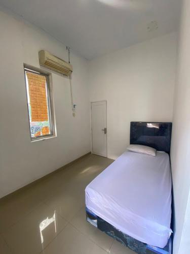 Katil atau katil-katil dalam bilik di Kamar Kost