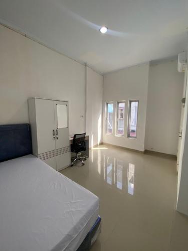 Katil atau katil-katil dalam bilik di Kamar Kost