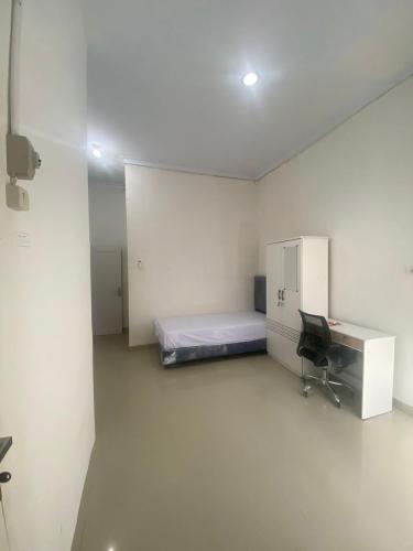Katil atau katil-katil dalam bilik di Kamar Kost