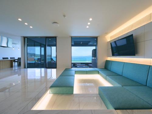Μια τηλεόραση ή/και κέντρο ψυχαγωγίας στο private villa YUHIMI 夕日見の丘
