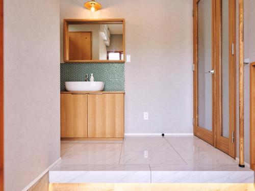 Φωτογραφία από το άλμπουμ του private villa YUHIMI 夕日見の丘 σε Wajiki