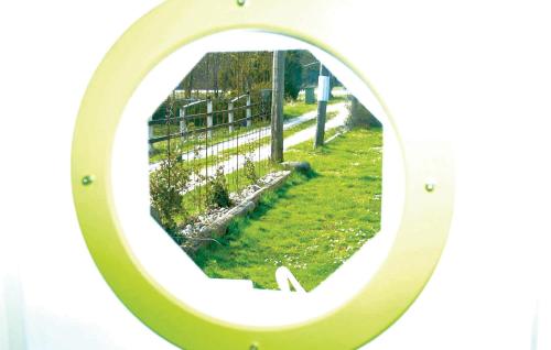 a magnifying glass image of a garden through a fence at Stunning Home In Lärbro With Wifi in Lärbro