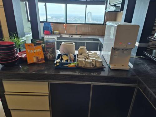 Η κουζίνα ή μικρή κουζίνα στο Riverview Pelangi Kota Bharu B2312