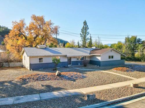 a house with a solar array on top of it at Palmer Pointe Heights Colorado Adventure Home Base WiFi, AC & Pets in Colorado Springs