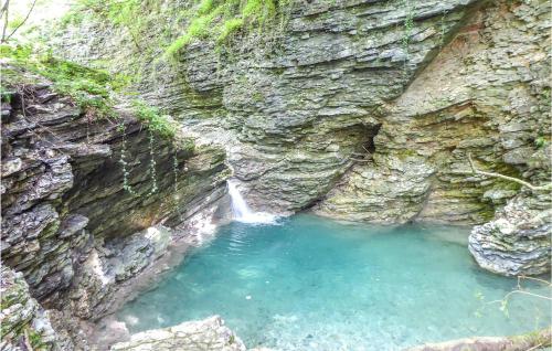 a small pool of water in a rocky cliff at Alla Cocca in San Donato
